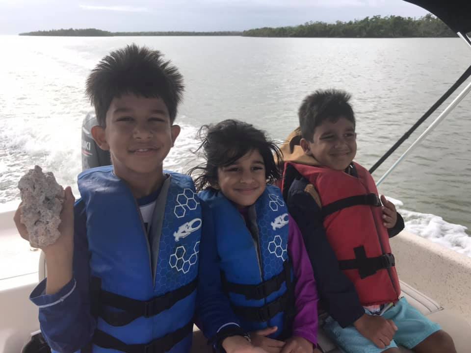 Kids in life jackets, ready to go shelling