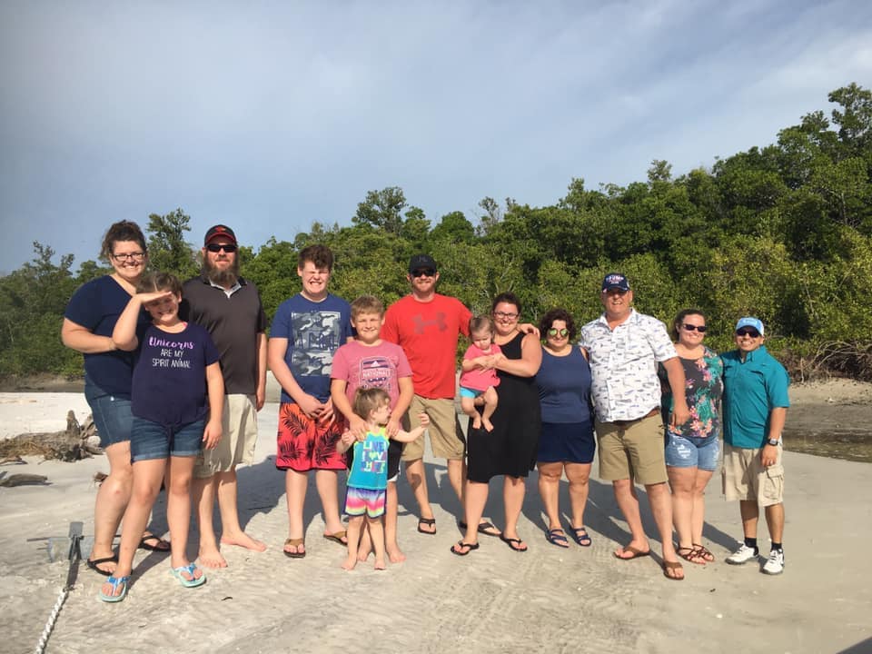 Families boarding the Sand Dollar shelling boat at San Marco Marina
